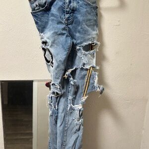 AMIRI Blue Skinny Distressed Jeans